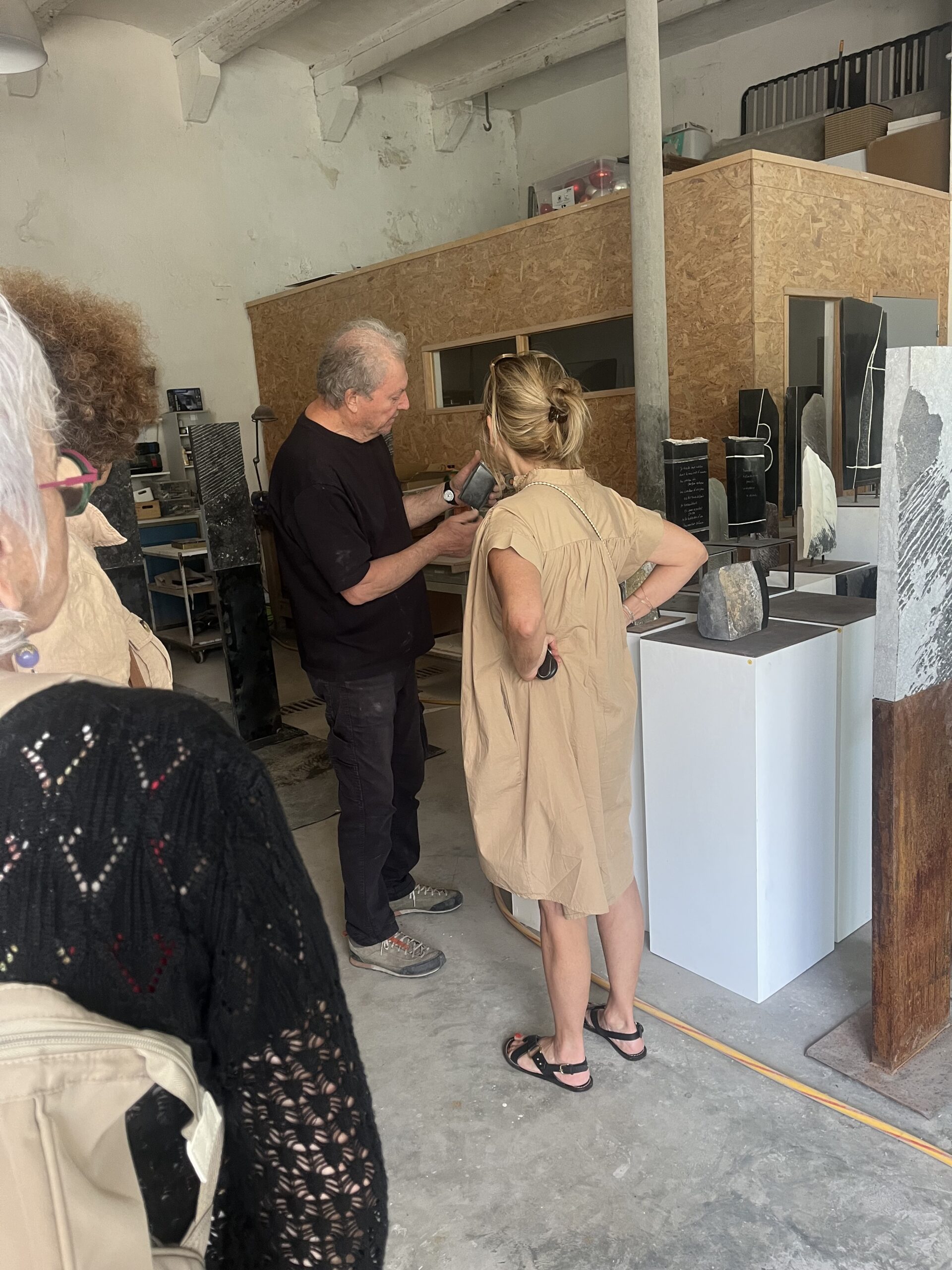 People participating in a studio visit