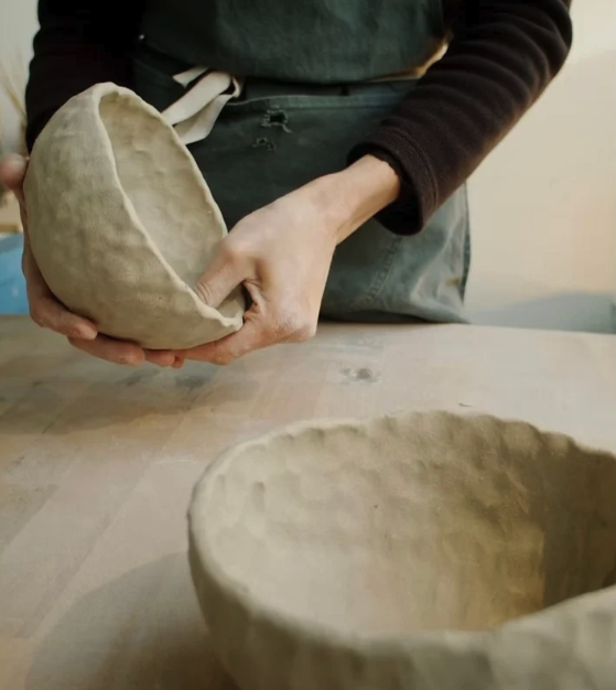 Agathe Rottier working on a material-based artwork